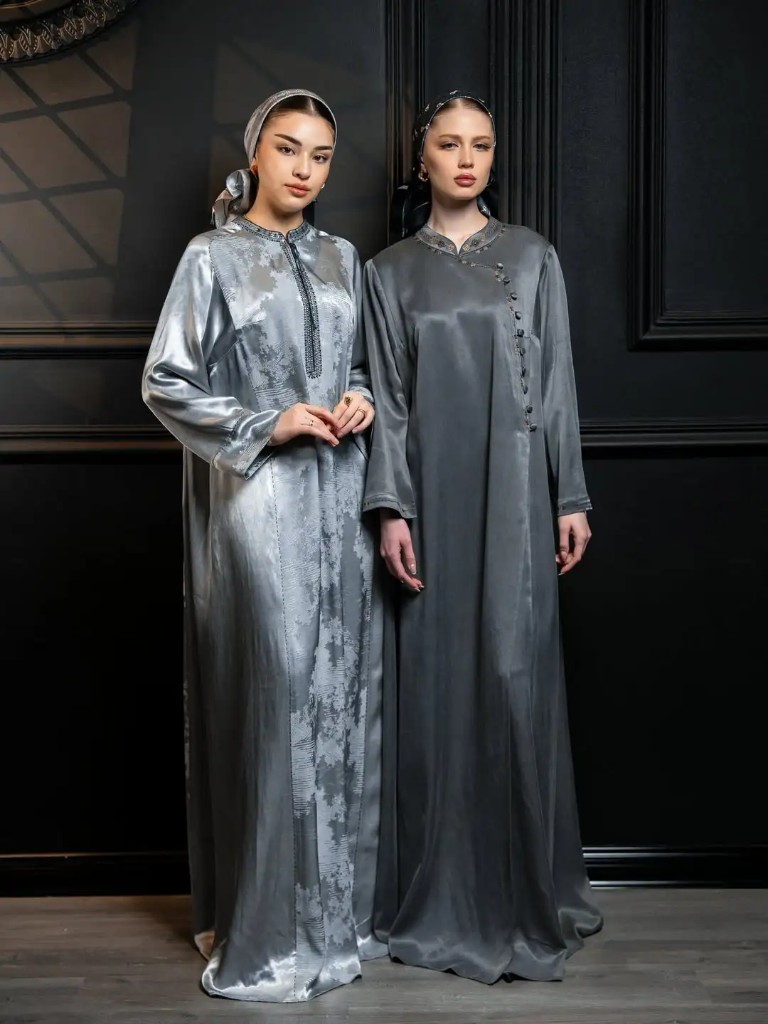 Silver and charcoal satin in candlelit interior